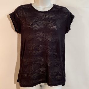 Tag has been removed. - Black see through top. Size S